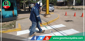 Se concientiza en educación vial a pobladores con el pintado  de señalizaciones en Yarinacocha