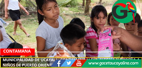 Municipalidad de Ucayali - Contamana lleva alegría navideña a niños de Puerto Oriente